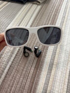 Oakley White Frame Polarized Sunglasses with Dark Lenses